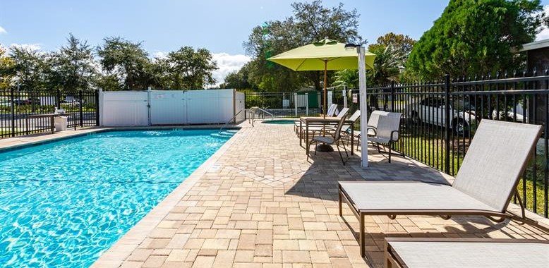 pool with chairs